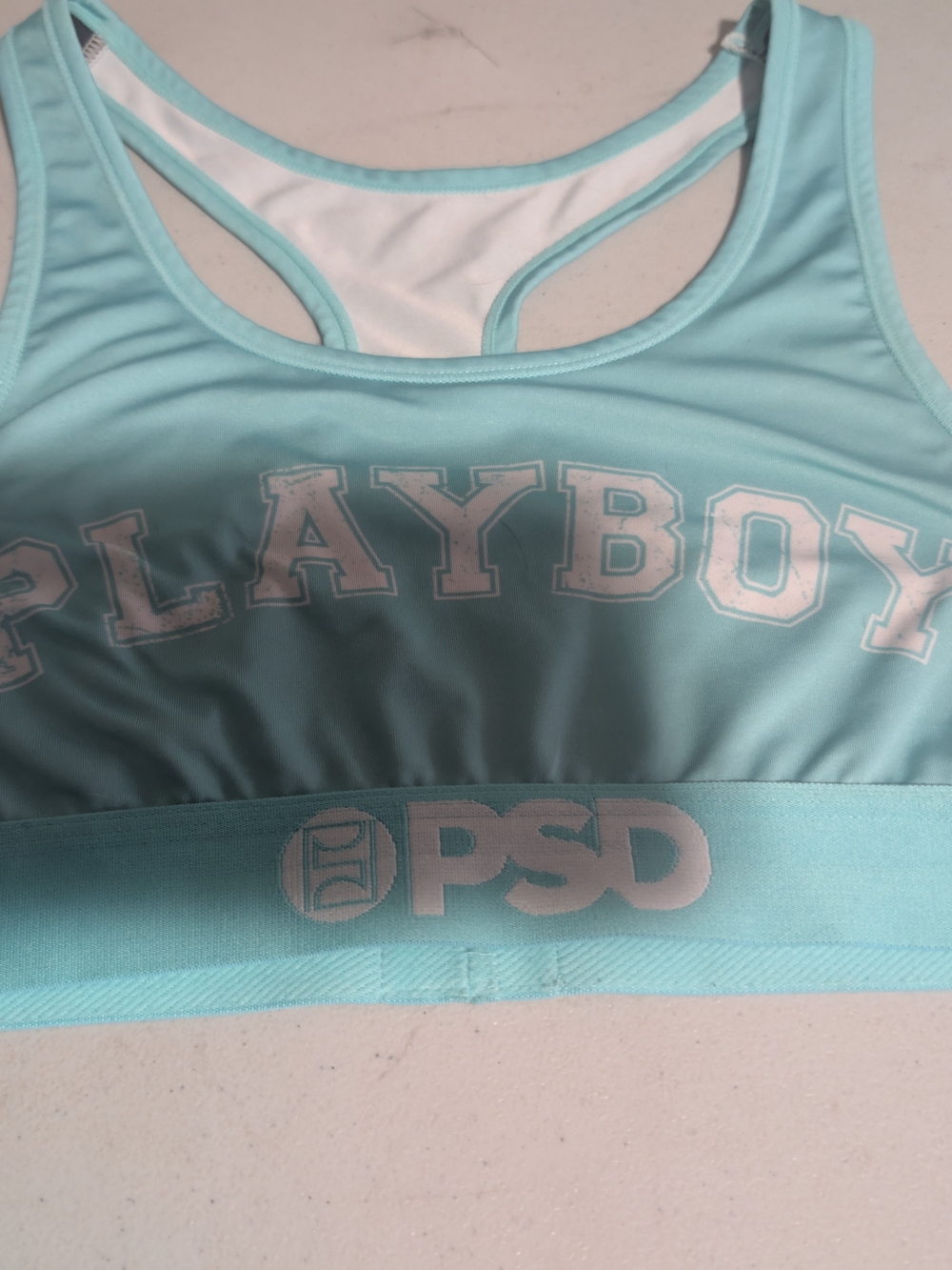 PLAYBOY Women’s Light Blue Sports Swim Top